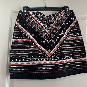 Embroidered mini skirt with sequencing